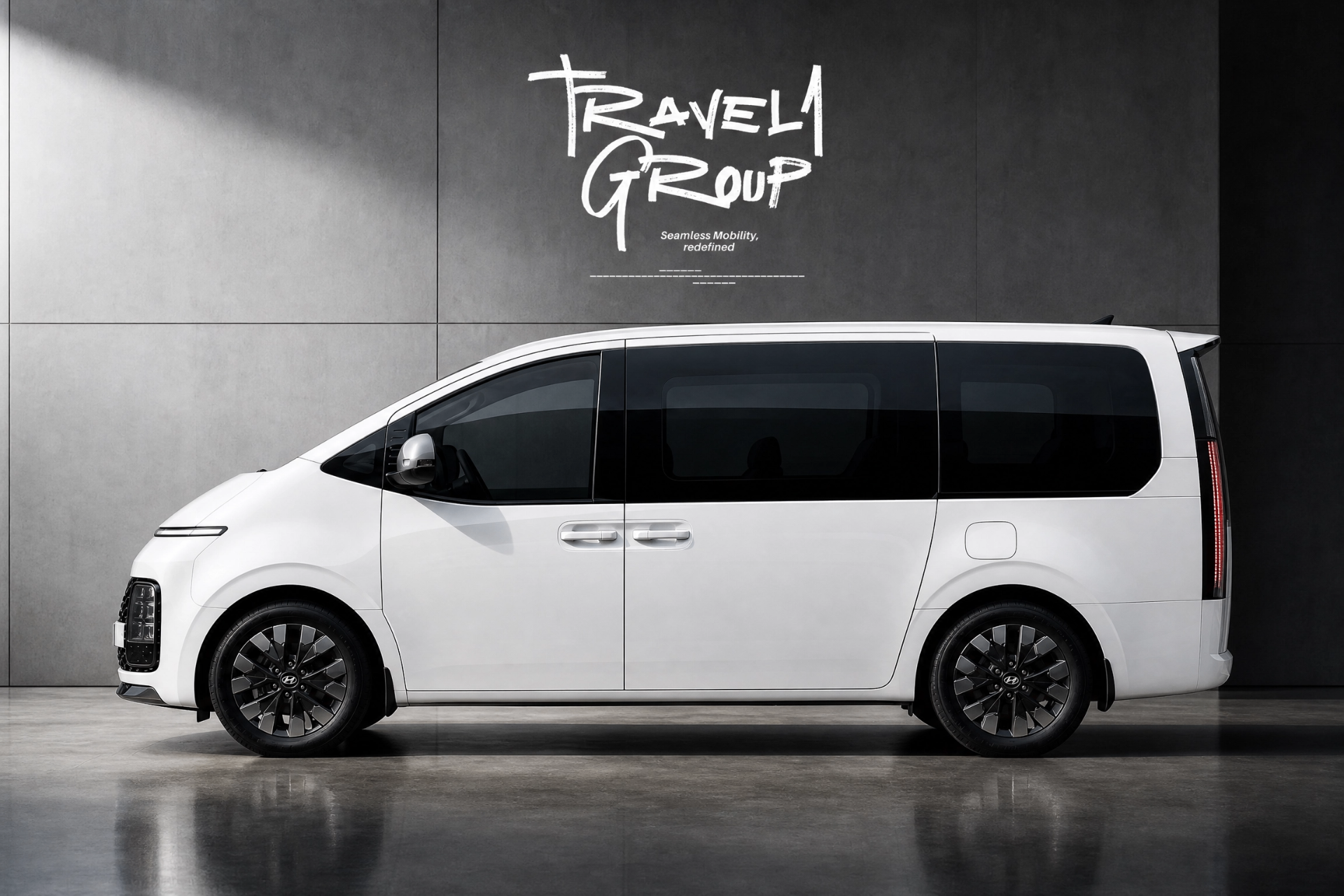 Travel1Group white Hyundai Staria with logo